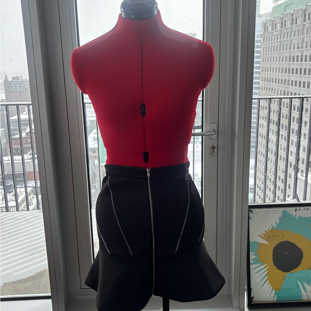 Black Pencil Skirt with Flounce Hem and Front Zip